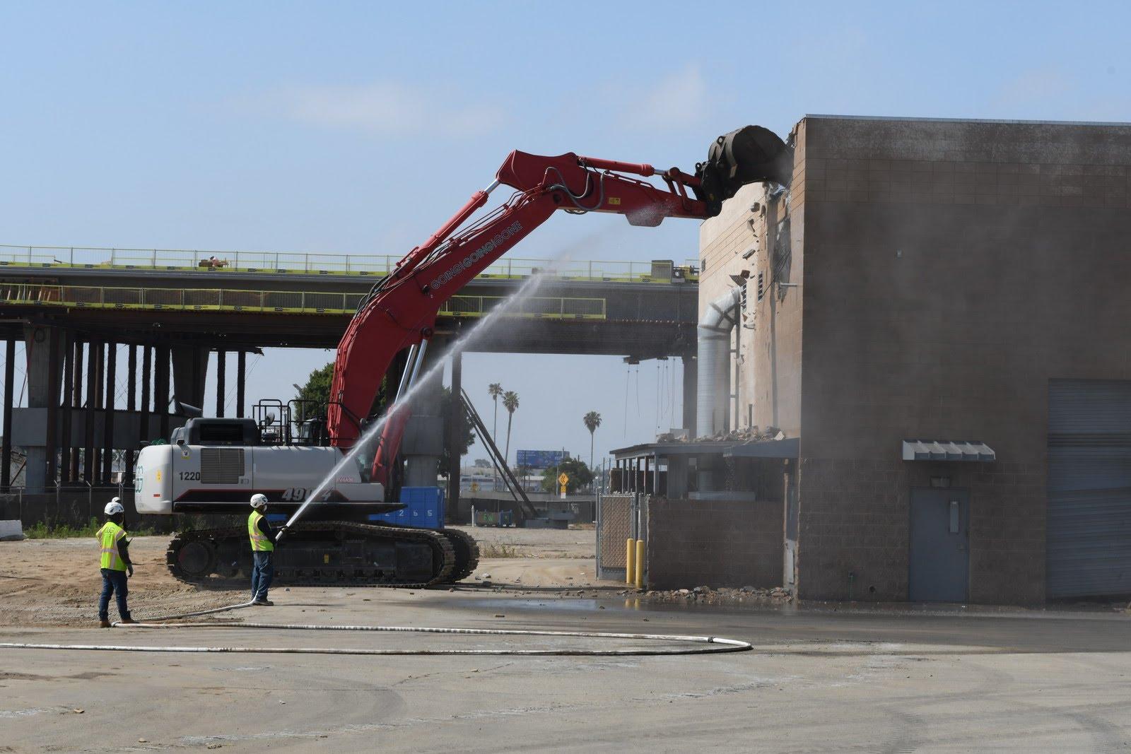 Demolition of old building on the site. In the background is the LAX Automated People Mover, which is currently under construction.